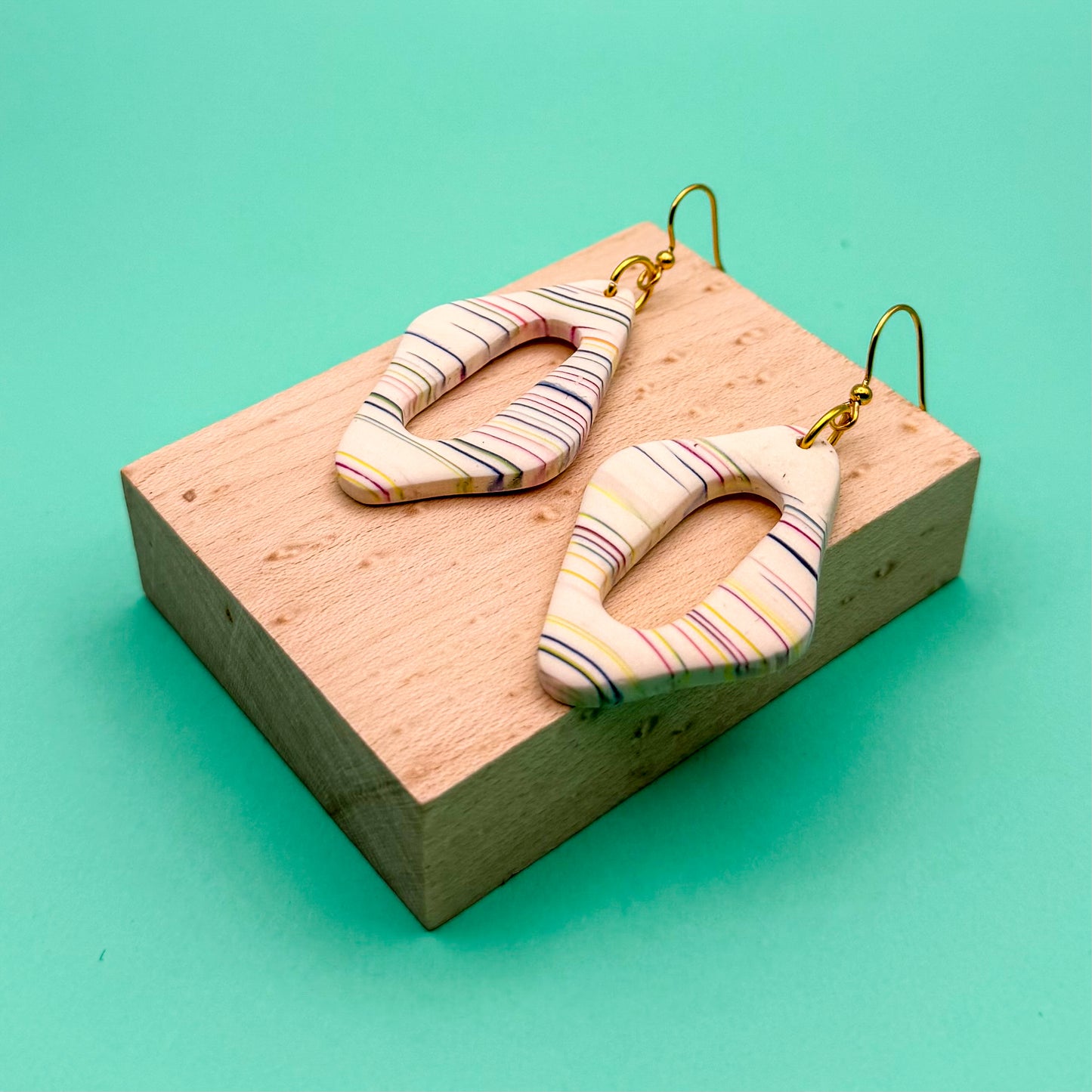 Abstract Oval Cutout Earring – Cream with Rainbow Linework